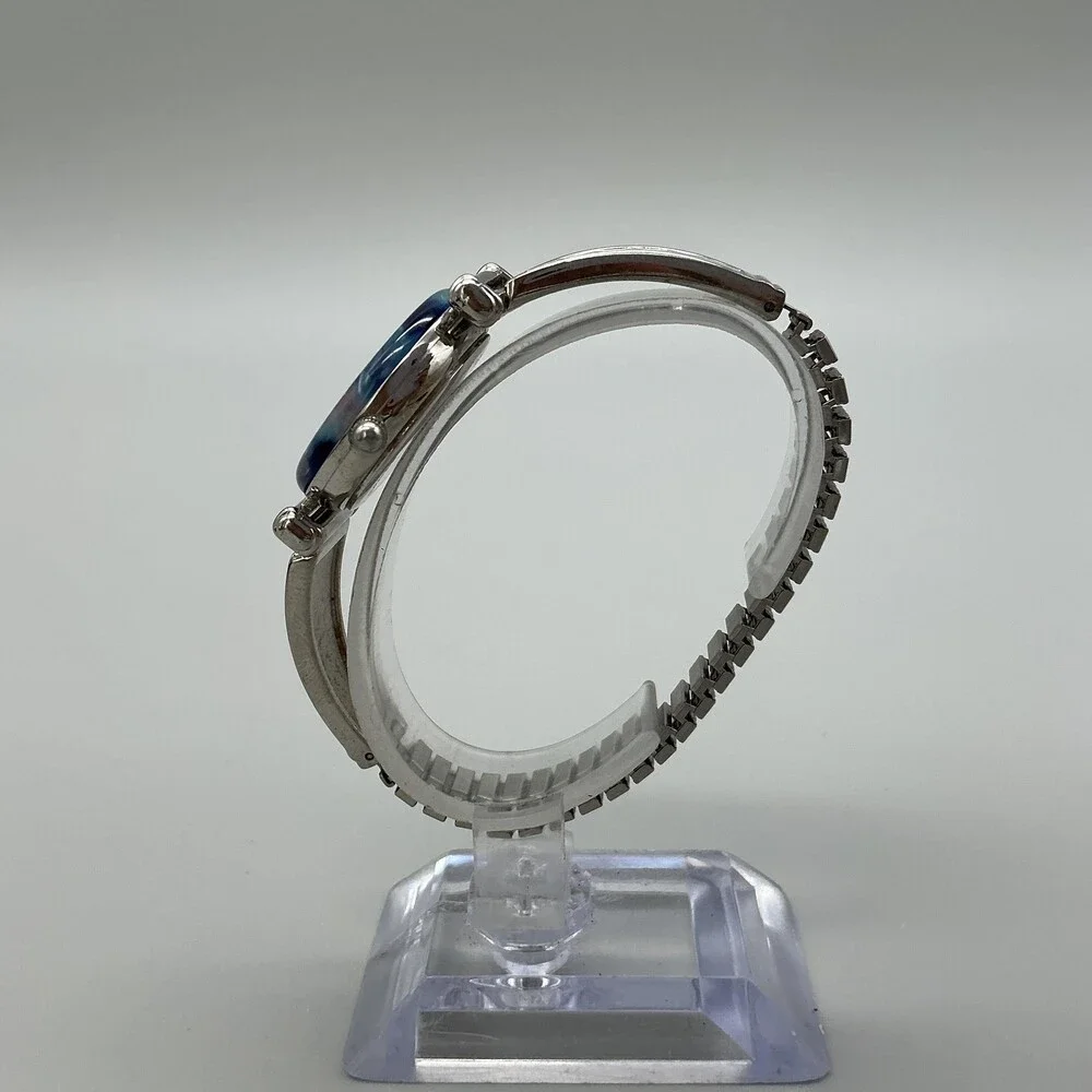 Avon Womens Watch 28mm Blue Abalone Bezel Inlay Stretch F69038-1/P New Battery